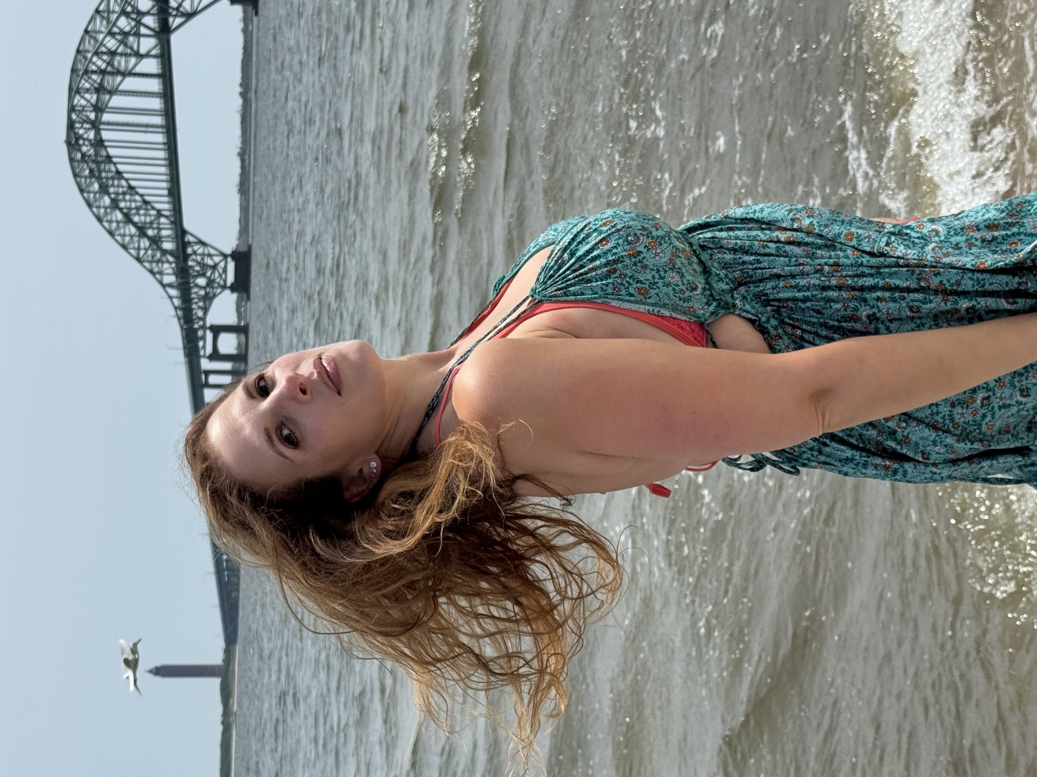 Megan Dupuis standing beside the ocean
